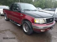 ✅ 2003 Ford F-150 XL • VIN: 1FTRX17273NA51602 • Lot: 43039407. Listed on IAAI with 184,431 mi. Free auction sales archive from the USA and detailed vehicle history report at DreamBid. Image 1.