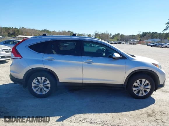 ✅ 2014 Honda CR-V EX-L • VIN: 2HKRM4H79EH630906 • Lot: 41857046. Listed on IAAI with 158,749 mi. Free auction sales archive from the USA and detailed vehicle history report at DreamBid. Image 13.