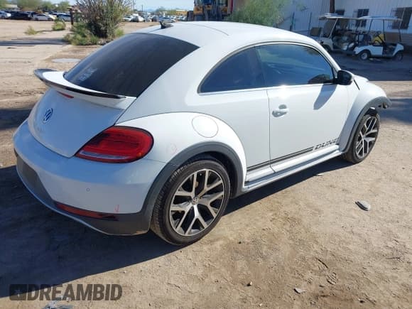 ✅ 2016 Volkswagen Beetle Dune • VIN: 3VWS17AT8GM632868 • Lot: 43810321. Listed on IAAI with 75,311 mi. Free auction sales archive from the USA and detailed vehicle history report at DreamBid. Image 4.