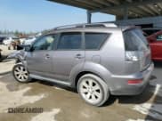 ✅ 2012 Mitsubishi Outlander SE • VIN: JA4AS3AW4CU027714 • Lot: 57773435. Wystawiony na Copart z przebiegiem 148 897 mil. Bezpłatny archiwum sprzedaży aukcyjnych z USA i szczegółowy raport historii pojazdu na DreamBid. Zdjęcie 2.