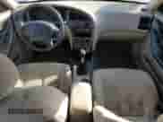 2002 Hyundai Elantra GLS z VIN KMHDN45D22U434479, wystawiony jako Copart lot #77869634 z przebiegiem 231 962 mil mil oraz Szkoda całkowita • Salvage title. Historia ofert i sprzedaży dostępna na DreamBid. Obrazek 8.