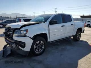 ✅ 2021 Chevrolet Colorado 2WD Z71 • VIN: 1GCGSDEN2M1107250 • Лот: 71486235. Опубликован ранее на Copart с пробегом 127 837 миль. Бесплатный доступ к архиву аукционных продаж из США и подробный отчёт об истории автомобиля на DreamBid. Изображение 1.