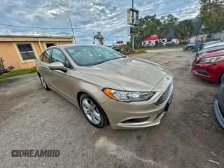 ✅ 2018 Ford Fusion S • VIN: 3FA6P0UU3JR100345 • Лот: 94828225. Опубликован ранее на Copart с пробегом 46 569 миль. Бесплатный доступ к архиву аукционных продаж из США и подробный отчёт об истории автомобиля на DreamBid. Изображение 1.