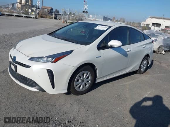 ✅ 2020 Toyota Prius LE • VIN: JTDKARFU6L3120442 • Lot: 43402603. Listed on IAAI with 77,570 mi. Free auction sales archive from the USA and detailed vehicle history report at DreamBid. Image 2.