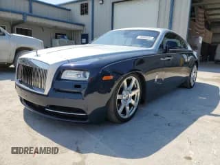 ✅ 2014 Rolls-Royce Wraith • VIN: SCA665C58EUX84660 • Lot: 76050444. Wystawiony na Copart z przebiegiem 46 271 mil. Bezpłatny archiwum sprzedaży aukcyjnych z USA i szczegółowy raport historii pojazdu na DreamBid. Zdjęcie 1.