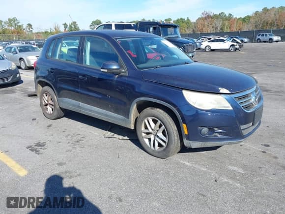 ✅ 2011 Volkswagen Tiguan S • VIN: WVGAV7AX4BW512432 • Lot: 43714572. Listed on IAAI with 112,953 mi. Free auction sales archive from the USA and detailed vehicle history report at DreamBid. Image 1.