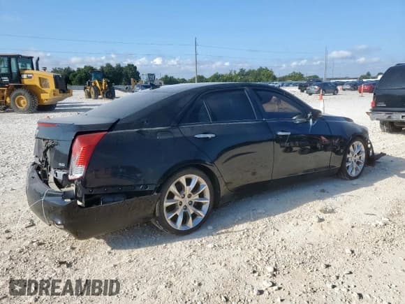 ✅ 2014 Cadillac CTS Premium RWD • VIN: 1G6AT5S35E0182112 • Лот: 68580295. Опубликован ранее на Copart с пробегом 185 989 миль. Бесплатный доступ к архиву аукционных продаж из США и подробный отчёт об истории автомобиля на DreamBid. Изображение 3.