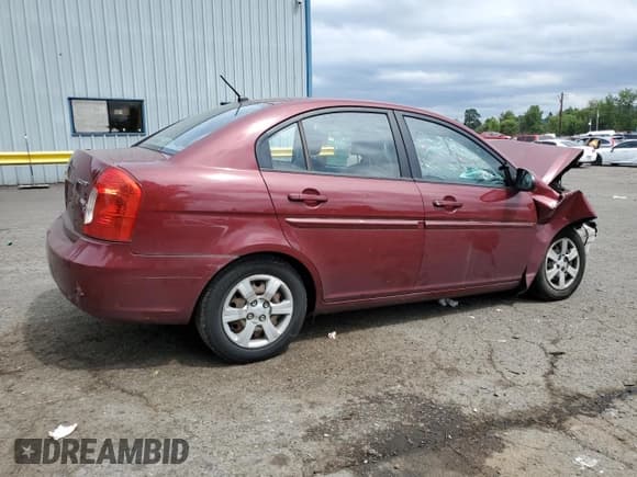 ✅ 2007 Hyundai Accent GLS • VIN: KMHCN46C07U087078 • Лот: 62572255. Опубликован ранее на Copart с пробегом 192 195 миль. Бесплатный доступ к архиву аукционных продаж из США и подробный отчёт об истории автомобиля на DreamBid. Изображение 3.