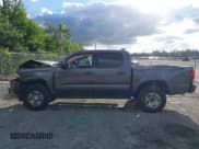 ✅ 2020 Toyota Tacoma SR5 • VIN: 5TFAX5GN7LX180619 • Lot: 43459642. Listed on IAAI with 141,205 mi. Free auction sales archive from the USA and detailed vehicle history report at DreamBid. Image 15.