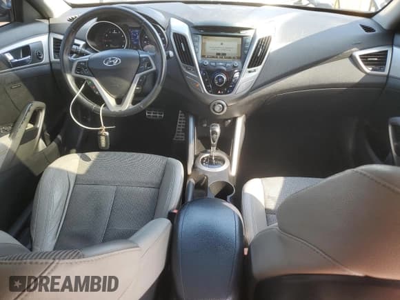 ✅ 2013 Hyundai Veloster w/Black Int • VIN: KMHTC6AD1DU166479 • Lot: 89491335. Wystawiony na Copart z przebiegiem 141 390 mil. Bezpłatny archiwum sprzedaży aukcyjnych z USA i szczegółowy raport historii pojazdu na DreamBid. Zdjęcie 8.