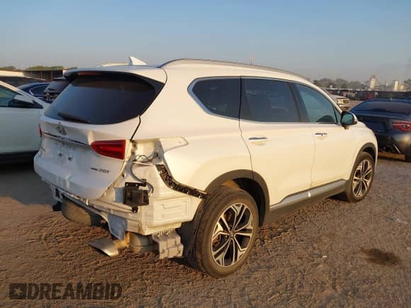 2020 Hyundai Santa Fe SEL z VIN 5NMS3CAAXLH216029, wystawiony jako IAAI lot #43222450 z przebiegiem 70 337 mil mil oraz . Historia ofert i sprzedaży dostępna na DreamBid. Obrazek 4.