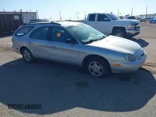 ✅ 1996 Ford Taurus GL • VIN: 1FALP57U9TG184497 • Lot: 42290105. Listed on IAAI with 149,155 mi. Free auction sales archive from the USA and detailed vehicle history report at DreamBid. Image 1.