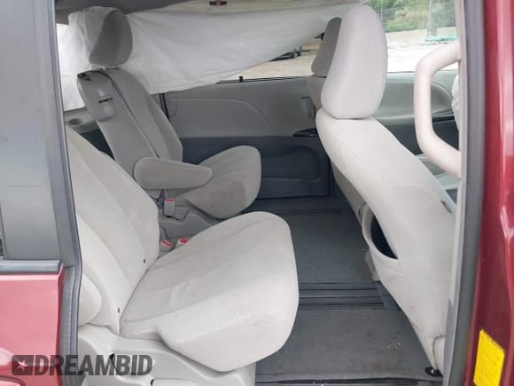 ✅ 2014 Toyota Sienna LE AAS • VIN: 5TDKK3DC7ES435563 • Lot: 43014633. Listed on IAAI with 201,161 mi. Free auction sales archive from the USA and detailed vehicle history report at DreamBid. Image 8.