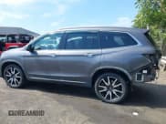 ✅ 2019 Honda Pilot Touring 8-Passenger • VIN: 5FNYF5H95KB010979 • Lot: 43285702. Listed on IAAI with 147,812 mi. Free auction sales archive from the USA and detailed vehicle history report at DreamBid. Image 14.