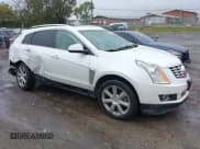 ✅ 2014 Cadillac SRX Premium Collection • VIN: 3GYFNDE32ES677700 • Lot: 43493053. Wystawiony na IAAI z przebiegiem 129 524 mil. Bezpłatny archiwum sprzedaży aukcyjnych z USA i szczegółowy raport historii pojazdu na DreamBid. Zdjęcie 1.