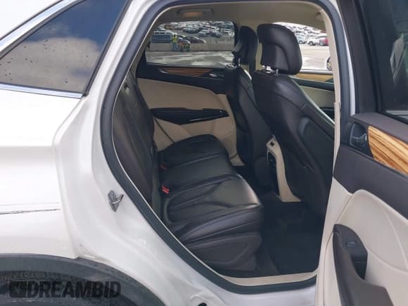 ✅ 2016 Lincoln MKC Select • VIN: 5LMCJ2D97GUJ18122 • Lot: 43250455. Listed on IAAI with 84,126 mi. Free auction sales archive from the USA and detailed vehicle history report at DreamBid. Image 8.