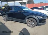 ✅ 2021 Mazda CX-30 Select • VIN: 3MVDMBBL3MM244834 • Lot: 43273875. Listed on IAAI with 76,889 mi. Free auction sales archive from the USA and detailed vehicle history report at DreamBid. Image 1.
