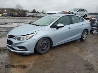 ✅ 2018 Chevrolet Cruze LS • VIN: 1G1BC5SM3J7138517 • Lot: 38025823. Listed on Copart with 220,781 mi. Free auction sales archive from the USA and detailed vehicle history report at DreamBid. Image 1.