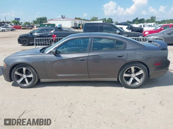 2014 Dodge Charger SXT Plus z VIN 2C3CDXHG2EH256675, wystawiony jako IAAI lot #43153204 z przebiegiem 139 843 mil mil oraz . Historia ofert i sprzedaży dostępna na DreamBid. Obrazek 14.