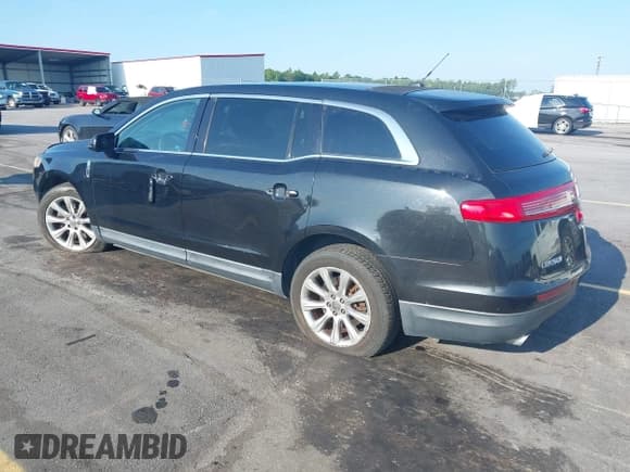 ✅ 2014 Lincoln MKT • VIN: 2LMHJ5FK2EBL50158 • Lot: 42607852. Listed on IAAI with 249,480 mi. Free auction sales archive from the USA and detailed vehicle history report at DreamBid. Image 3.
