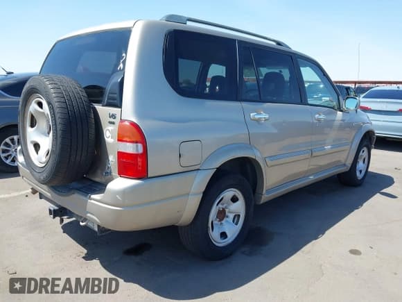 ✅ 2003 Suzuki XL7 Touring • VIN: JS3TX92V534103046 • Lot: 41978971. Listed on IAAI with 185,038 mi. Free auction sales archive from the USA and detailed vehicle history report at DreamBid. Image 4.