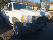 ✅ 2012 Chevrolet Silverado 2500HD LT • VIN: 1GC1KXCG2CF156302 • Lot: 43600860. Listed on IAAI with 208,899 mi. Free auction sales archive from the USA and detailed vehicle history report at DreamBid. Image 1.