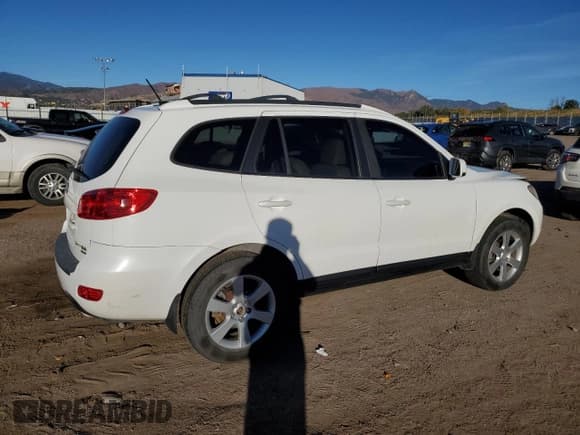 ✅ 2007 Hyundai Santa Fe SE • VIN: 5NMSH73EX7H060038 • Lot: 77424034. Listed on Copart with 129,542 mi. Free auction sales archive from the USA and detailed vehicle history report at DreamBid. Image 3.