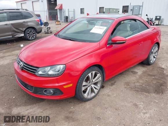 ✅ 2013 Volkswagen Eos Executive • VIN: WVWFW8AH5DV003044 • Lot: 41920847. Listed on IAAI with 114,566 mi. Free auction sales archive from the USA and detailed vehicle history report at DreamBid. Image 2.