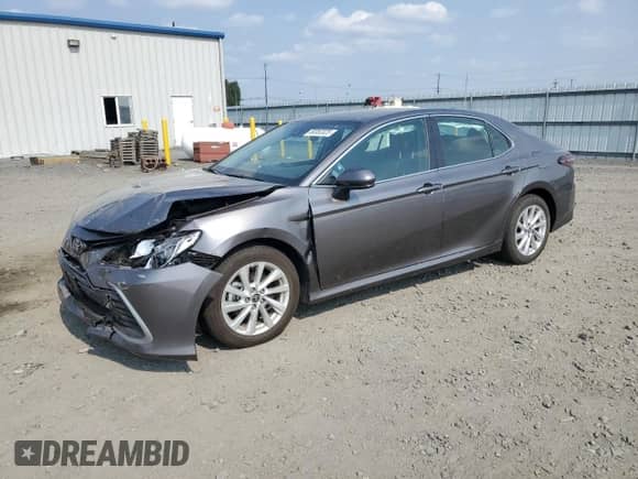 2023 Toyota Camry LE с VIN 4T1C11BK4PU107355, выставлен на аукционе Copart как лот 80353325 с пробегом 7 174 миль миль и Списание • Salvage title. История ставок и продаж доступна на DreamBid. Изображение 1.
