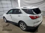 ✅ 2020 Chevrolet Equinox Premier • VIN: 3GNAXXEV2LS512716 • Лот: 69396435. Опубликован ранее на Copart с пробегом 112 182 миль. Бесплатный доступ к архиву аукционных продаж из США и подробный отчёт об истории автомобиля на DreamBid. Изображение 2.