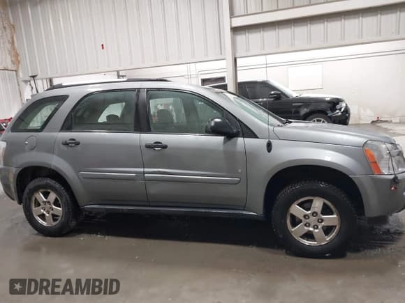 ✅ 2006 Chevrolet Equinox LS • VIN: 2CNDL23F866211432 • Лот: 41356271. Опубликован ранее на IAAI с пробегом 143 876 миль. Бесплатный доступ к архиву аукционных продаж из США и подробный отчёт об истории автомобиля на DreamBid. Изображение 13.