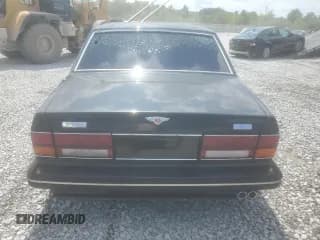 ✅ 1991 Bentley Turbo R • VIN: SCBZR03D9MCX36017 • Lot: 68878525. Wystawiony na Copart z przebiegiem Nie podano. Bezpłatny archiwum sprzedaży aukcyjnych z USA i szczegółowy raport historii pojazdu na DreamBid. Zdjęcie 6.