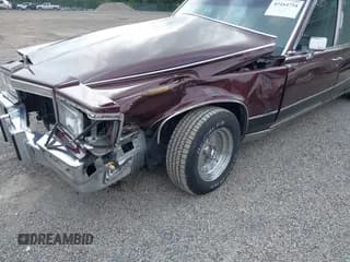 ✅ 1991 Cadillac Brougham • VIN: 1G6DW54E3MR719461 • Лот: 43164754. Опубликован ранее на IAAI с пробегом 78 105 миль. Бесплатный доступ к архиву аукционных продаж из США и подробный отчёт об истории автомобиля на DreamBid. Изображение 6.