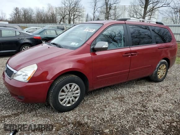 ✅ 2012 Kia Sedona LX • VIN: KNDMG4C71C6486722 • Lot: 93146315. Listed on Copart with 165,259 mi. Free auction sales archive from the USA and detailed vehicle history report at DreamBid. Image 1.