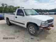 2002 Chevrolet Silverado 1500 with VIN 1GCEC14W32Z284577, listed as a Copart auction lot 69987265 with 504,167 mi miles and Salvage title. Bid and sale history available at DreamBid. Image 4.