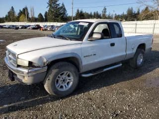 ✅ 2001 Dodge Dakota Sport • VIN: 1B7GG22N71S303684 • Lot: 52167635. Wystawiony na Copart z przebiegiem 151 354 mil. Bezpłatny archiwum sprzedaży aukcyjnych z USA i szczegółowy raport historii pojazdu na DreamBid. Zdjęcie 1.