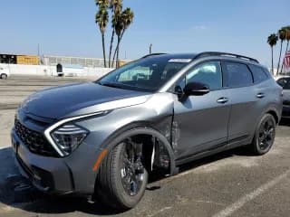 ✅ 2025 Kia Sportage X-Line Prestige • VIN: KNDPZDDH0S7183471 • Лот: 84290605. Опубликован ранее на Copart с пробегом 9 060 миль. Бесплатный доступ к архиву аукционных продаж из США и подробный отчёт об истории автомобиля на DreamBid. Изображение 1.