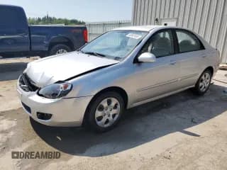 ✅ 2009 Kia Spectra LX • VIN: KNAFE222795620329 • Lot: 60062495. Listed on Copart with 136,566 mi. Free auction sales archive from the USA and detailed vehicle history report at DreamBid. Image 1.