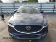 ✅ 2018 Mazda CX-5 Touring • VIN: JM3KFACM6J1448886 • Lot: 91935085. Wystawiony na Copart z przebiegiem 102 177 mil. Bezpłatny archiwum sprzedaży aukcyjnych z USA i szczegółowy raport historii pojazdu na DreamBid. Zdjęcie 5.