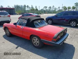 ✅ 1985 Alfa Romeo Spider Veloce • VIN: ZARBA5415F1021764 • Lot: 41747744. Wystawiony na IAAI z przebiegiem 890 900 mil. Bezpłatny archiwum sprzedaży aukcyjnych z USA i szczegółowy raport historii pojazdu na DreamBid. Zdjęcie 3.
