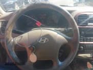 ✅ 2004 Hyundai Sonata GLS • VIN: KMHWF35HX4A913109 • Lot: 42711876. Listed on IAAI with 311,367 mi. Free auction sales archive from the USA and detailed vehicle history report at DreamBid. Image 11.