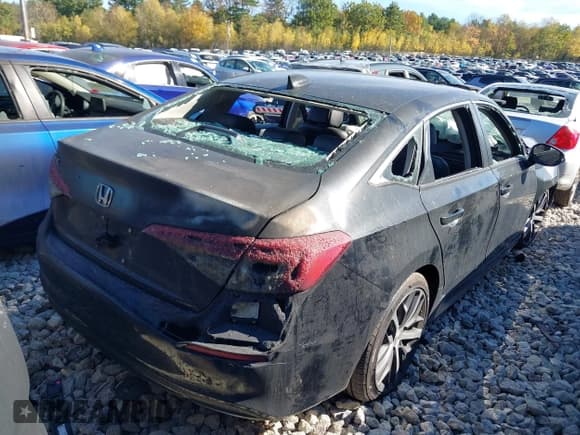 ✅ 2023 Honda Civic Touring • VIN: 2HGFE1F90PH308347 • Lot: 43071549. Listed on IAAI with 12,408 mi. Free auction sales archive from the USA and detailed vehicle history report at DreamBid. Image 4.