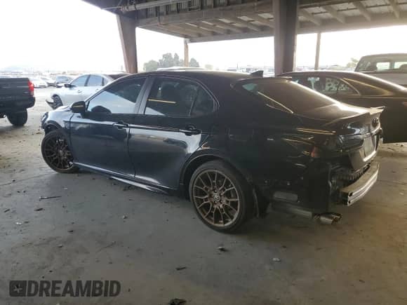 2023 Toyota Camry Hybrid SE с VIN 4T1G31AK6PU049665, выставлен на аукционе Copart как лот 81081585 с пробегом 15 205 миль миль и Списание • Salvage title. История ставок и продаж доступна на DreamBid. Изображение 2.