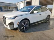 ✅ 2024 BMW iX xDrive50 • VIN: WB523CF01RCP94121 • Lot: 80173855. Listed on Copart with 22,190 mi. Free auction sales archive from the USA and detailed vehicle history report at DreamBid. Image 1.