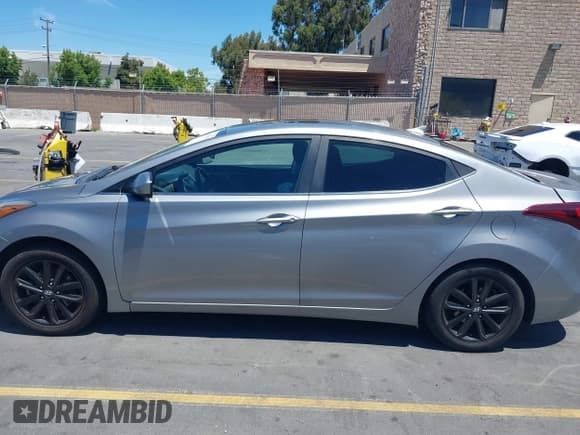 ✅ 2015 Hyundai Elantra SE • VIN: KMHDH4AE4FU344861 • Lot: 42821071. Listed on IAAI with 126,084 mi. Free auction sales archive from the USA and detailed vehicle history report at DreamBid. Image 14.
