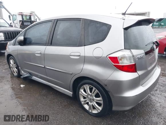 ✅ 2009 Honda Fit Sport • VIN: JHMGE87489S013652 • Lot: 43585614. Listed on IAAI with 136,013 mi. Free auction sales archive from the USA and detailed vehicle history report at DreamBid. Image 3.