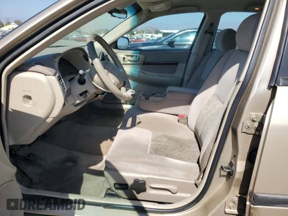 2004 Chevrolet Impala with VIN 2G1WF52E949127977, listed as a Copart auction lot 71259914 with 103,782 mi miles and Salvage title. Bid and sale history available at DreamBid. Image 7.