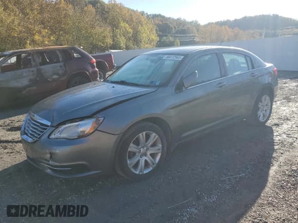 ✅ 2013 Chrysler 200 Touring • VIN: 1C3CCBBB0DN694247 • Lot: 86872965. Listed on Copart with 142,640 mi. Free auction sales archive from the USA and detailed vehicle history report at DreamBid. Image 1.
