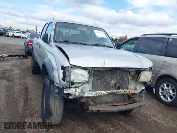 ✅ 2002 Toyota Tacoma PreRunner • VIN: 5TEGM92N22Z065158 • Lot: 43733818. Listed on IAAI with 275,626 mi. Free auction sales archive from the USA and detailed vehicle history report at DreamBid. Image 6.