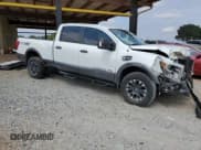 ✅ 2018 Nissan Titan Platinum Reserve • VIN: 1N6BA1F49JN521225 • Lot: 69831004. Listed on Copart with 92,536 mi. Free auction sales archive from the USA and detailed vehicle history report at DreamBid. Image 4.